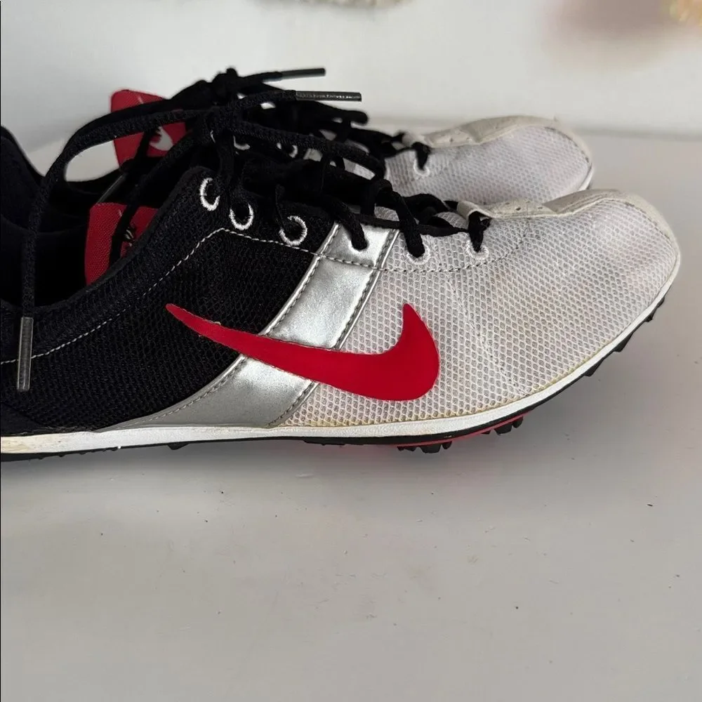 Nike Zoom Eldoret II track spikes in black, white, red, and silver. EUC